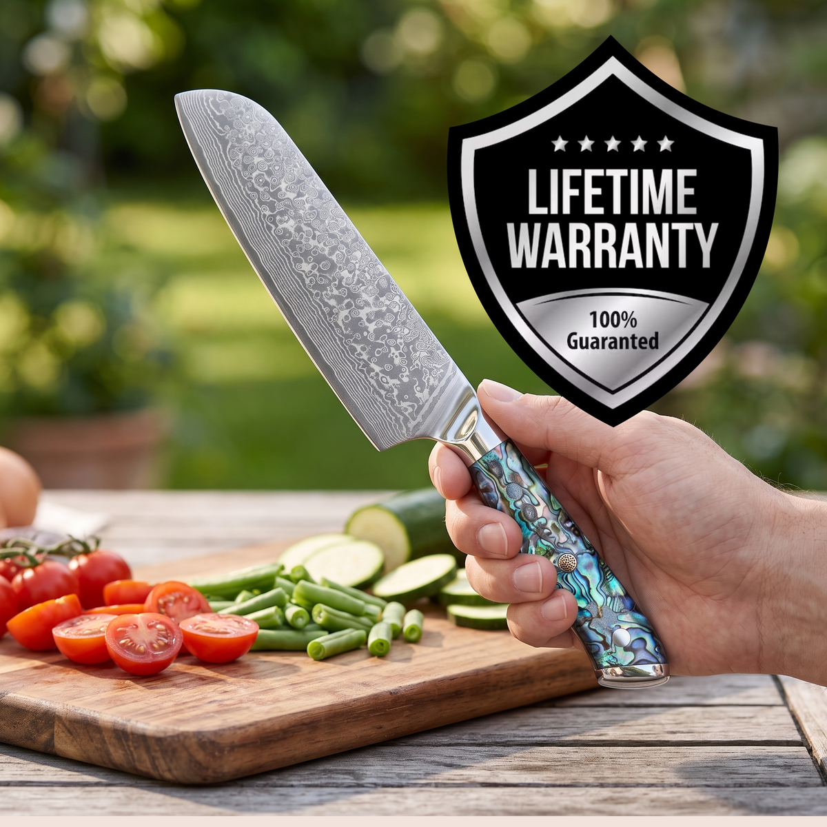 Santoku Knife 18 cm, Galaxy Aurora, abalone shell handle in hand with lifetime warranty badge