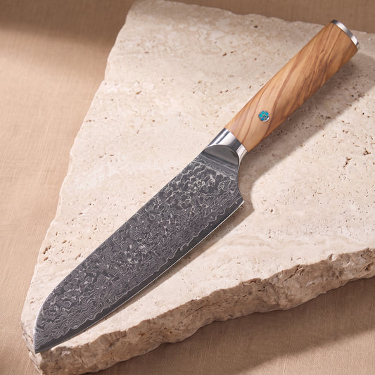 Santoku Knife 18 cm, Japanese Damascus steel, Galaxy Takumi, olive wood handle with turquoise pin, on natural stone