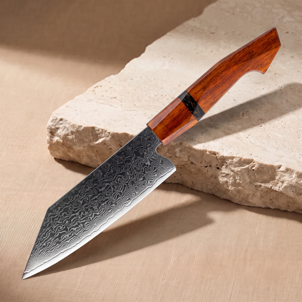 Bunka Knife 14 cm, Japanese Damascus steel, Galaxy Heritage, wooden handle, on natural stone