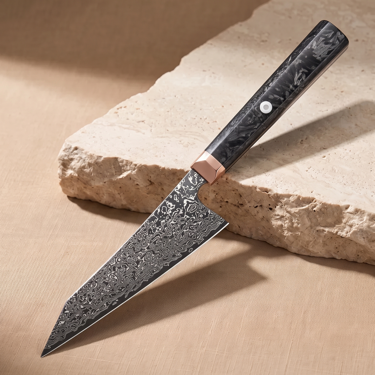 Bunka Knife 14 cm, Japanese Damascus steel, Galaxy Obsidian, dark carbon handle with copper bolster, on natural stone